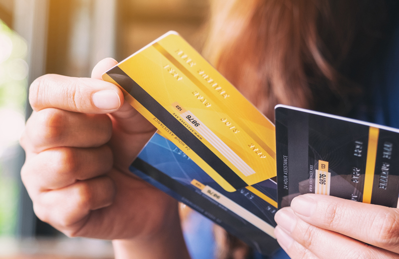 Woman holding credit card