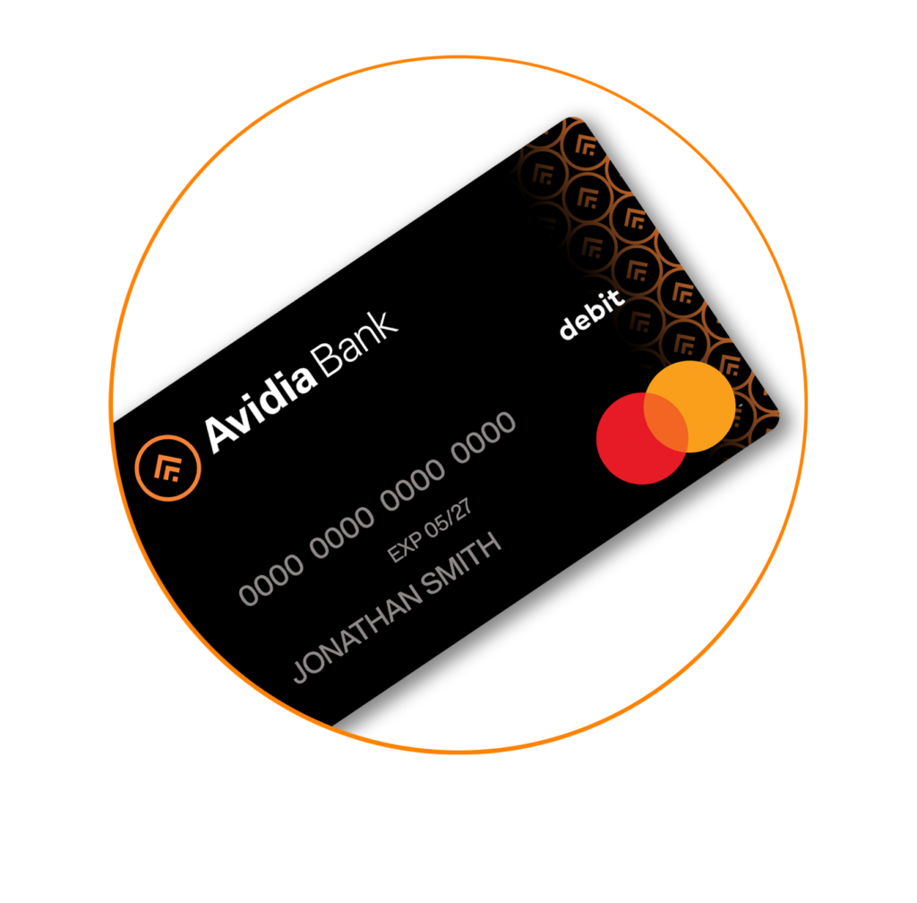 business owner sits at desk reviewing invoices and business cash flow