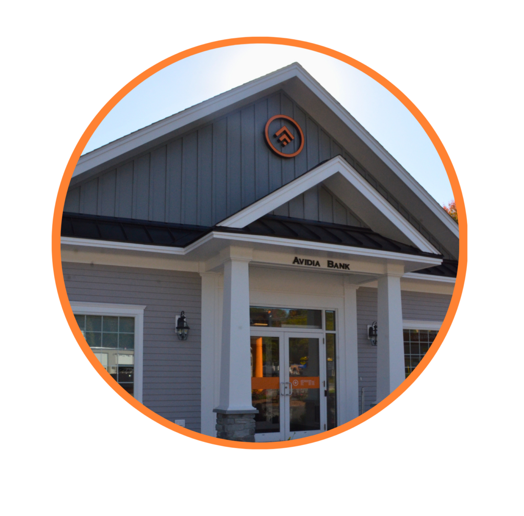 image of the front exterior of an Avidia Bank Branch: front doors with Avidia Bank logo above