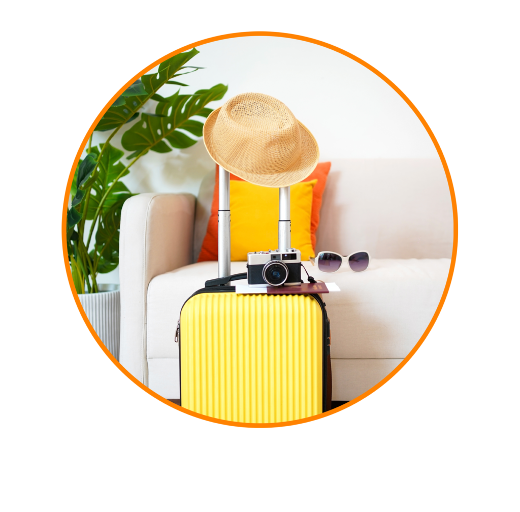 Yellow Suitcase with sunglasses and Sun hat